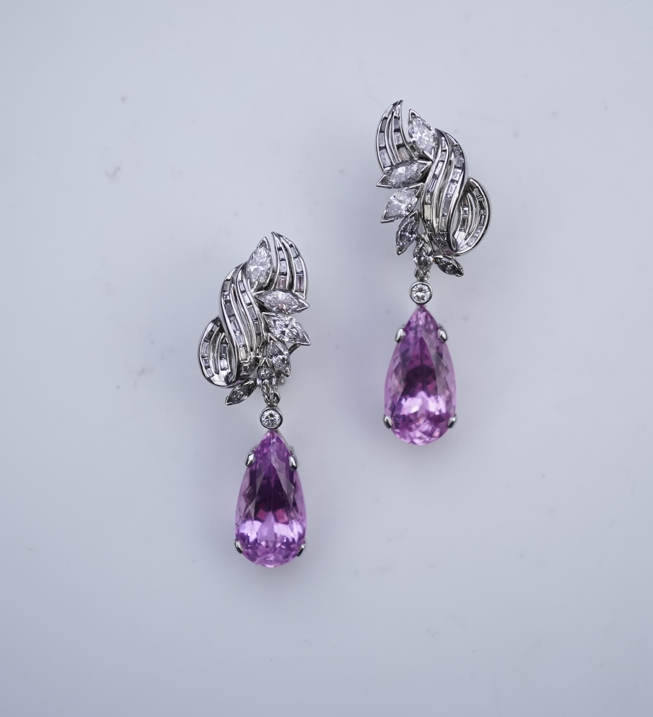 An attractive pair of 'day and night' kunzite and diamond ear clips